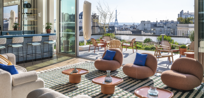 View from the lounge area to the roof terrace with a view of the Eiffel Tower