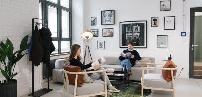 LOFT by Covivio showroom in a modern loft style with open-plan areas, high ceilings and industrial design elements.
